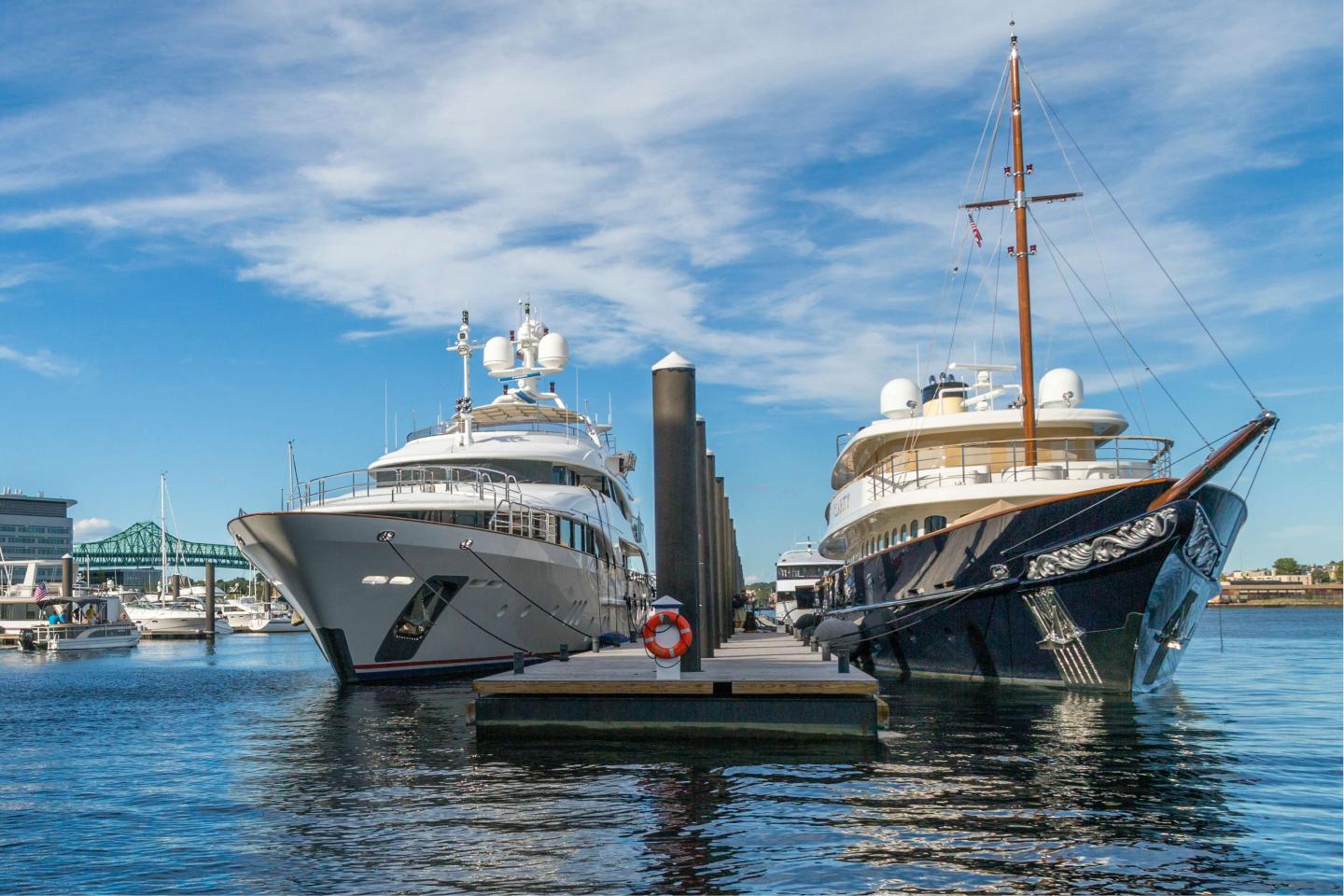 Yachts docked at a marina