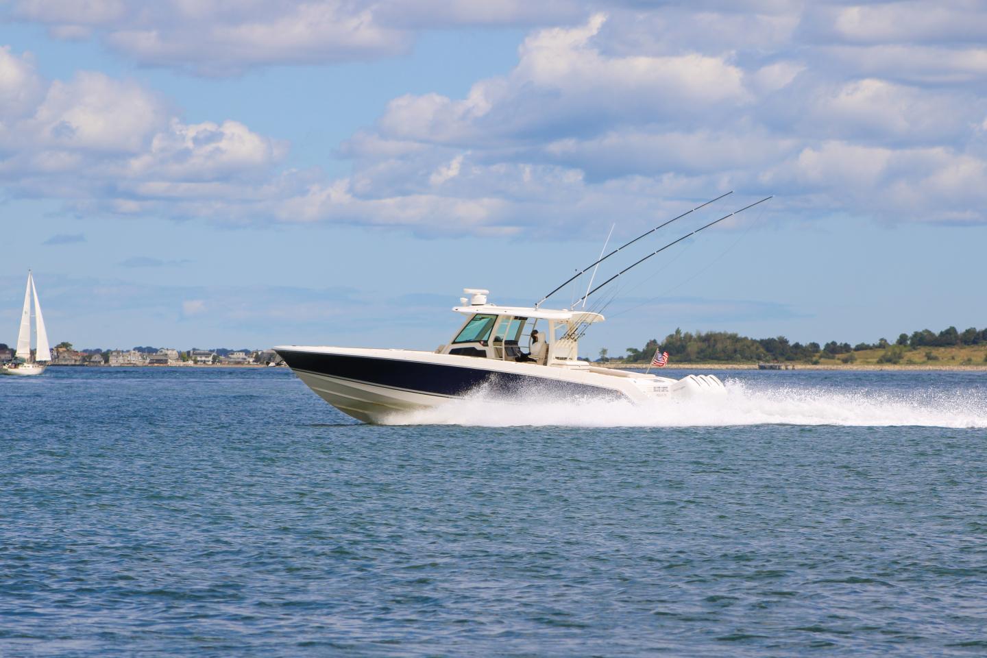 Boat cruising through Boston's outer harbor